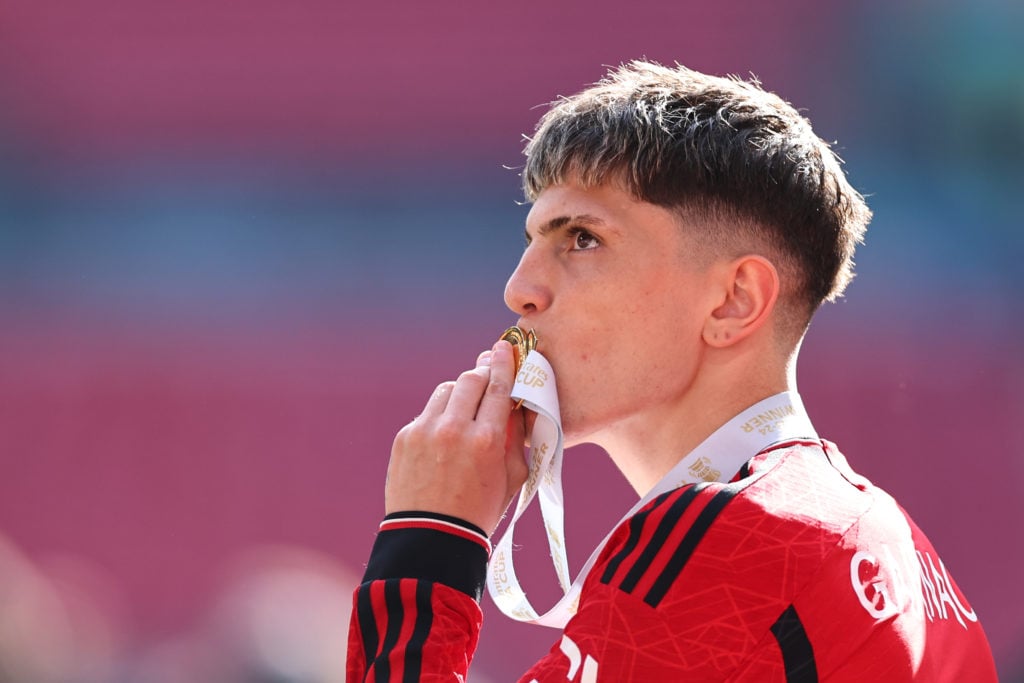 Manchester United's Alejandro Garnacho kisses his winners medal in time as Manchester United win the Emirates FA Cup 2024 during the Emirates...