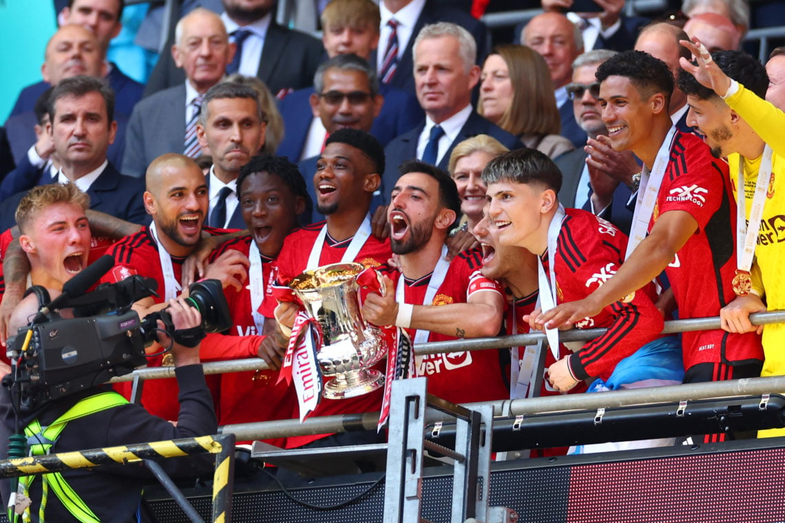 Bruno Fernandes of Manchester United lifts the trophy following the Emirates FA Cup Final match between Manchester City and Manchester United at We...