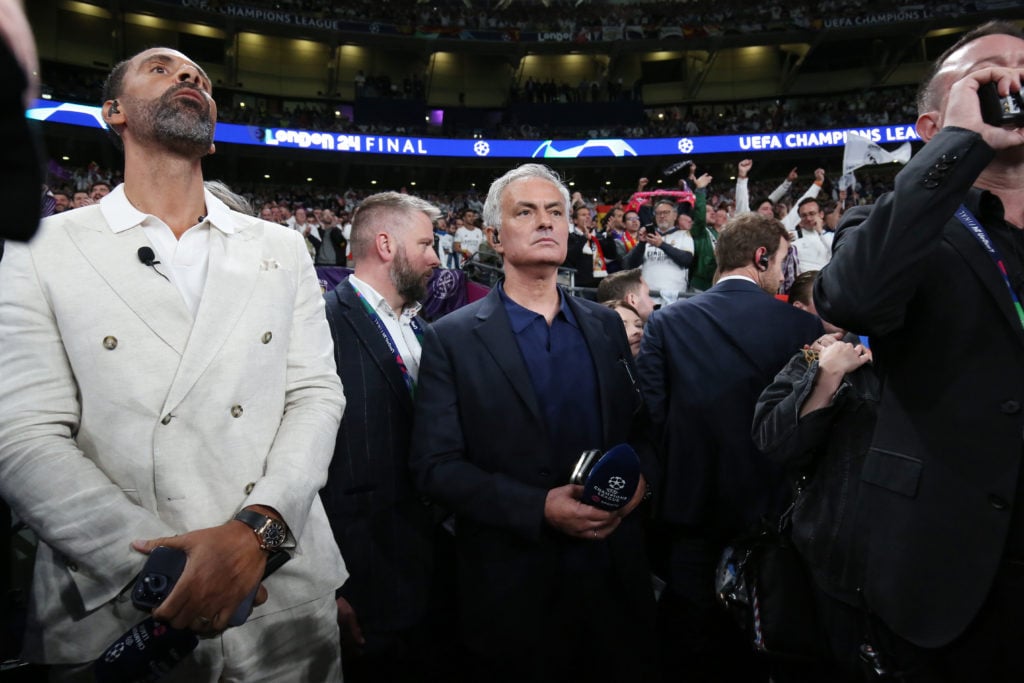 Manager and television pundit Jose Mourinho (C) looks on alongside Rio Ferdinand (L) after the UEFA Champions League 2023/24 final match between Bo...