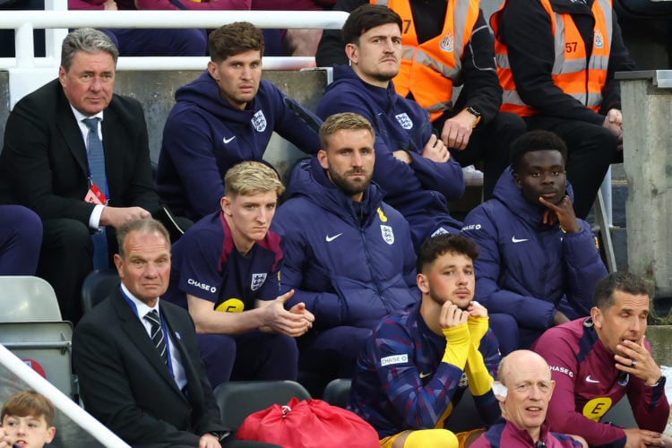 John Stones, Anthony Gordon, Luke Shaw, Harry Maguire, Bukayo Saka and James Trafford look on during the international friendly match between Engla...