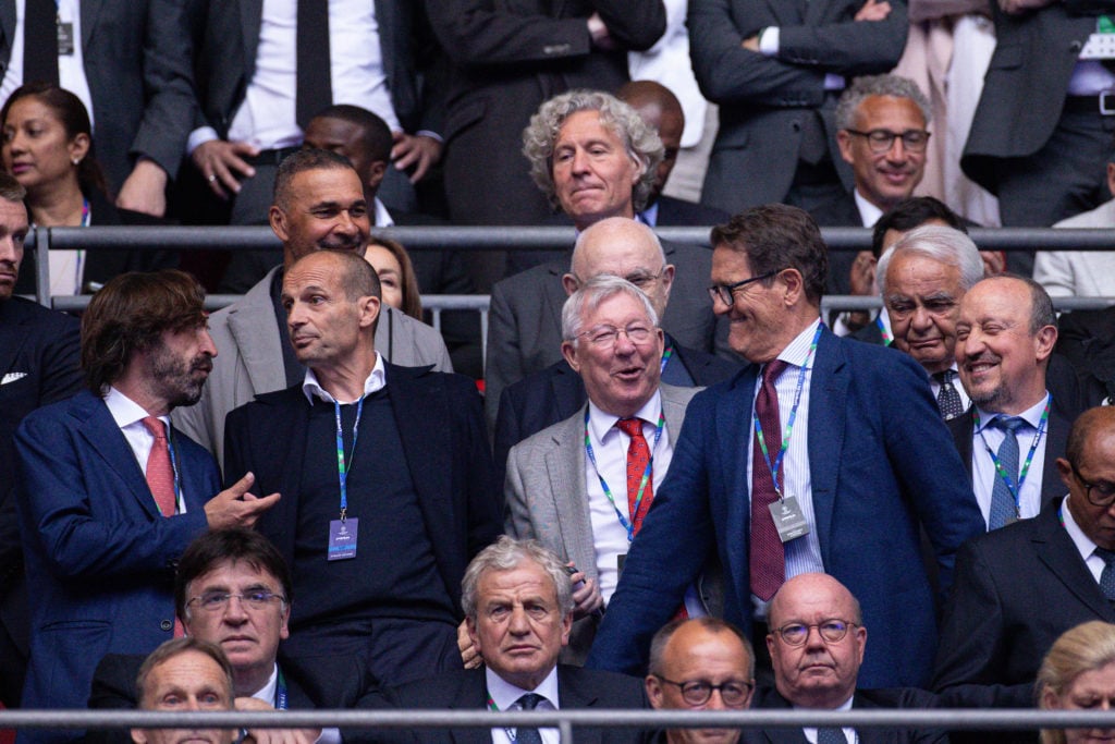 Andrea Pirlo, Ruud Gullit, Sir Alex Ferguson, Fabio Capello, and Rafa Benitez are standing before the UEFA Champions League Final between Borussia ...