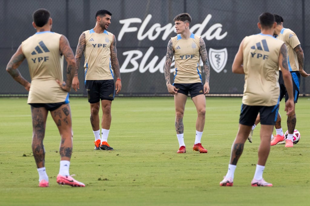(L-R) Cristian Romero and Alejandro Garnacho of Argentina talk during a training session at the Florida Blue Training Center on June 5, 2024 in Fort La...