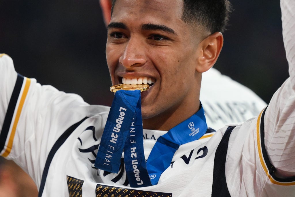 Jude Bellingham of Real Madrid bites the medal after his team's victory during the UEFA Champions League 2023/24 Final match between Borussia Dortm...