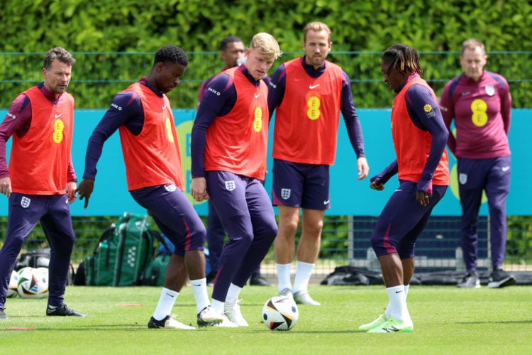 Marc Guehi, Jarrad Branthwaite and Eberechi Eze of England battle for possession during a training session at Tottenham Hotspur Training Centre on ...