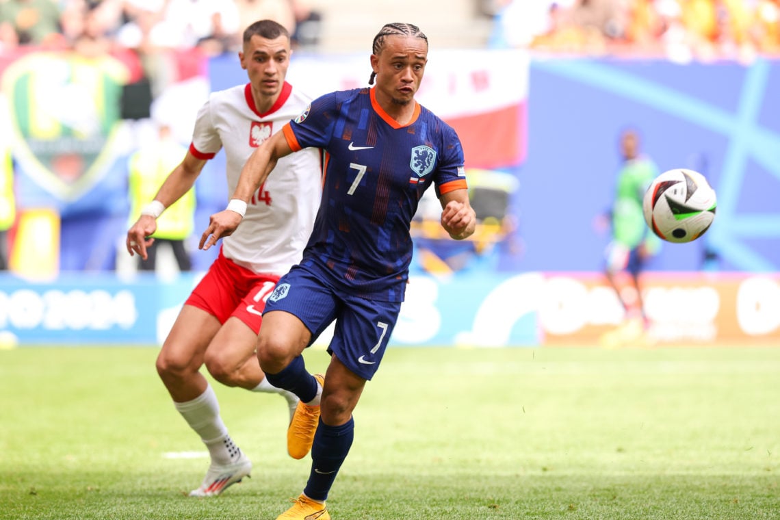 Jakub Kiwior of Poland battles for the ball with Xavi Simons of the Netherlands during the Group D - UEFA EURO 2024 match between Poland and Nether...