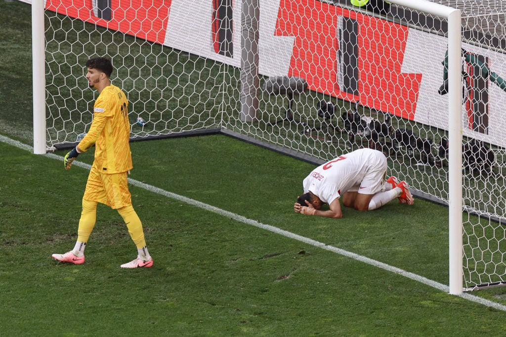 Turkey's goalkeeper #12 Altay Bayindir and defender #02 Zeki Celik react after their own goal during the UEFA Euro 2024 Group F football match betw...