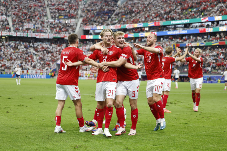 Morten Hjulmand of Denmark celebrates scoring the equalising goal with Joakim Maehle, Rasmus Hojlund and Christian Eriksen during the UEFA EURO 202...