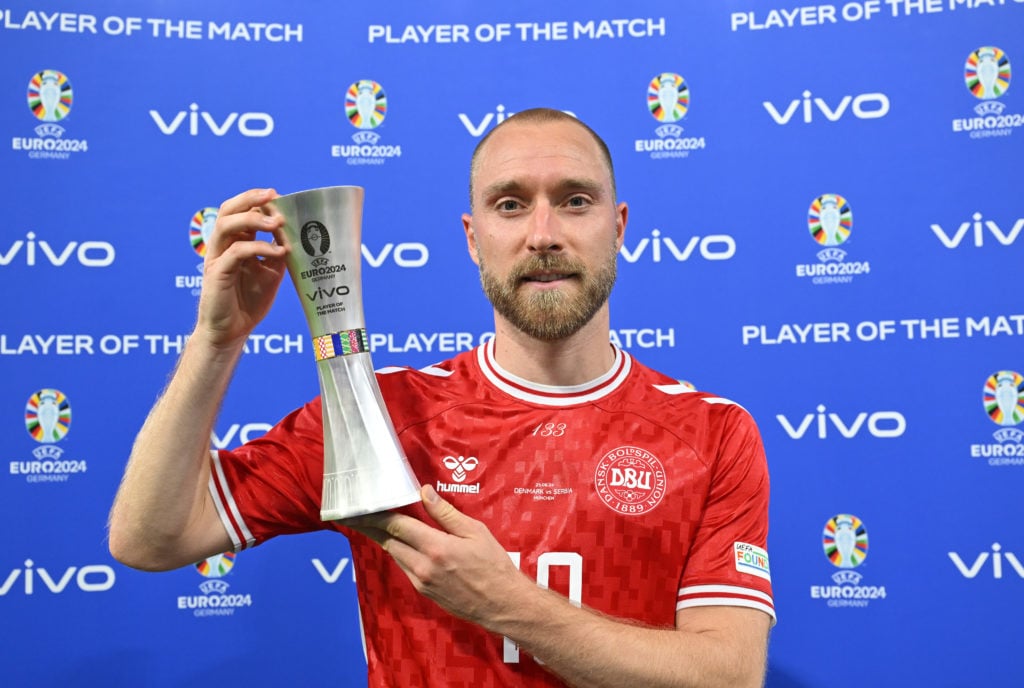 Christian Eriksen of Denmark poses for a photo with the Vivo Player of the Match award after the UEFA EURO 2024 group stage match between Denmark a...