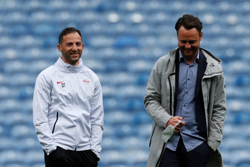 Domenico Tedesco, Head Coach of RB Leipzig speaks with Christopher Vivell, Technical Director of RB Leipzig during a RB Leipzig Training Session at...