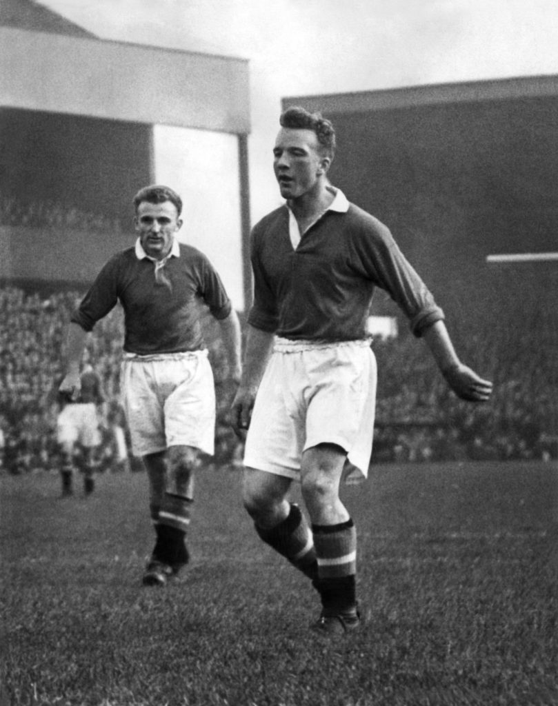 Don Gibson (left) and Jeff Whitefoot in action for Manchester United