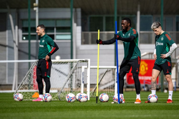 Diogo Dalot, Anthony Elanga and Alejandro Garnacho  of Manchester United in action during a first team training session at Carrington Training Grou...