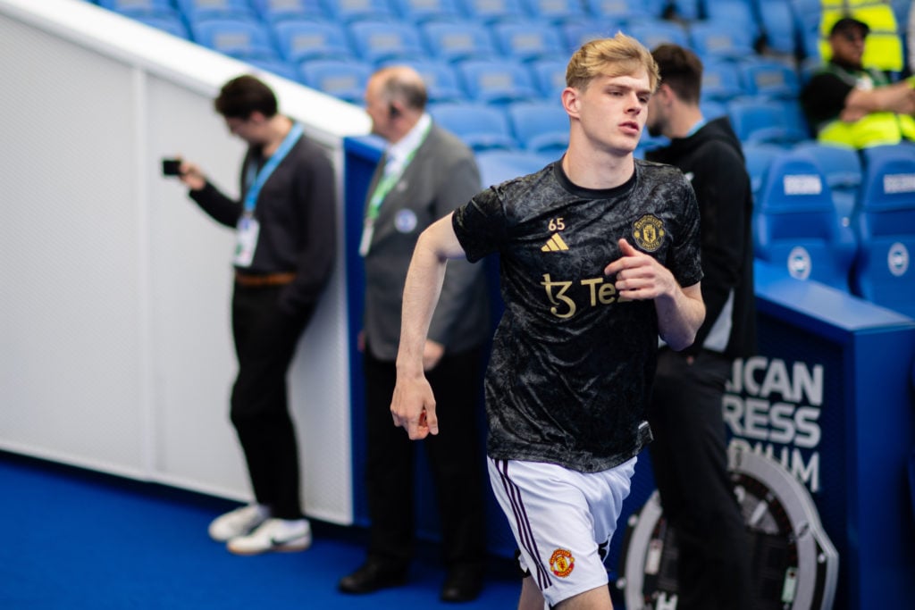 Toby Collyer of Manchester United warms up ahead of the Premier League match between Brighton & Hove Albion and Manchester United at American E...