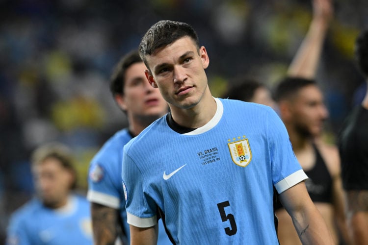 Uruguay's midfielder #05 Manuel Ugarte celebrates after scoring in a penalty shoot-out to win the Conmebol 2024 Copa America tournament quarterfina...