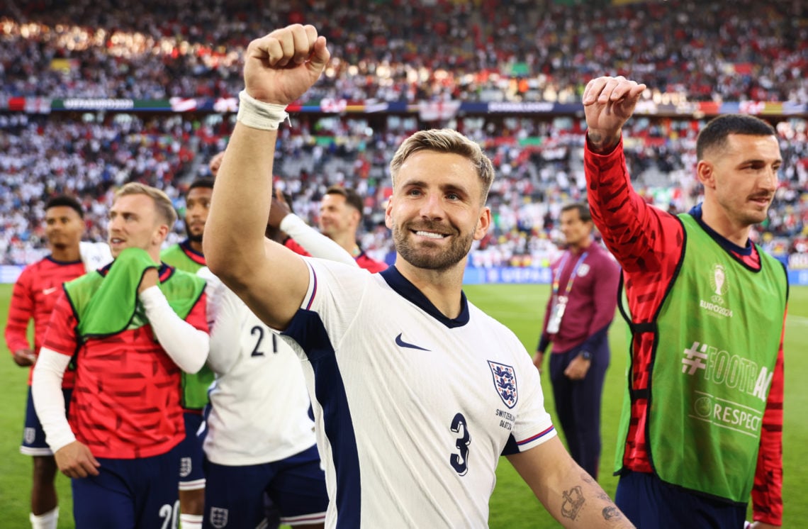 Luke Shaw of England celebrates following the team's victory in the penalty shoot out during the UEFA EURO 2024 quarter-final match between England...