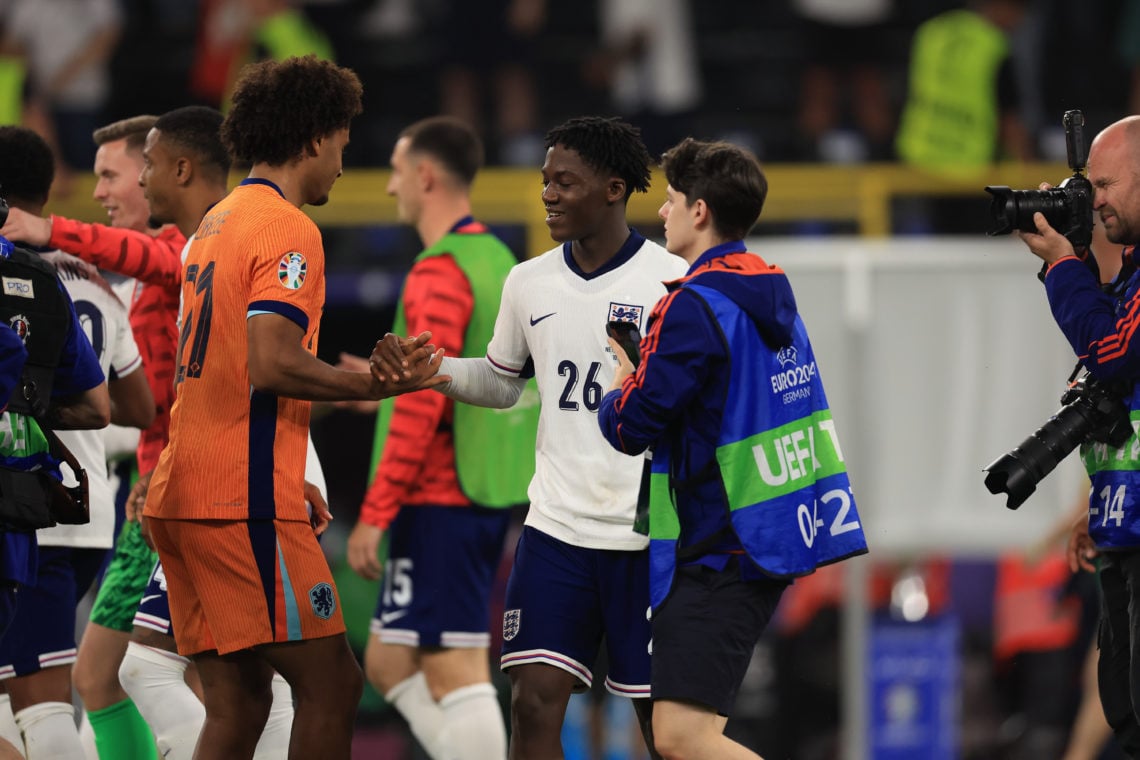 Kobbie Mainoo (England) is commiserating with Joshua Zirkzee (Netherlands) after the Semi Final of the UEFA European Championship between England a...