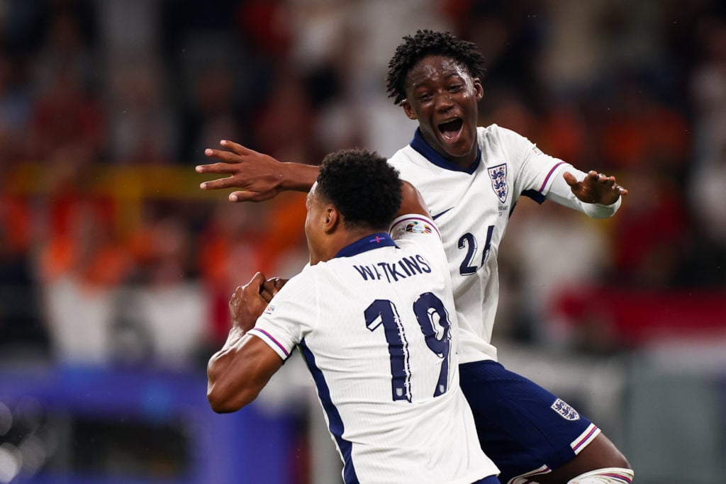 Ollie Watkins (L) and Kobbie Mainoo of England (R) celebrate after scoring a goal during the UEFA EURO 2024 match between Netherlands and England a...