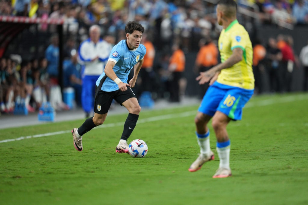 Facundo Pellistri #11 of the Uruguay Men's National Team dribbles the ball during a Copa America 2024 quarterfinal match between Uruguay and Brazil...