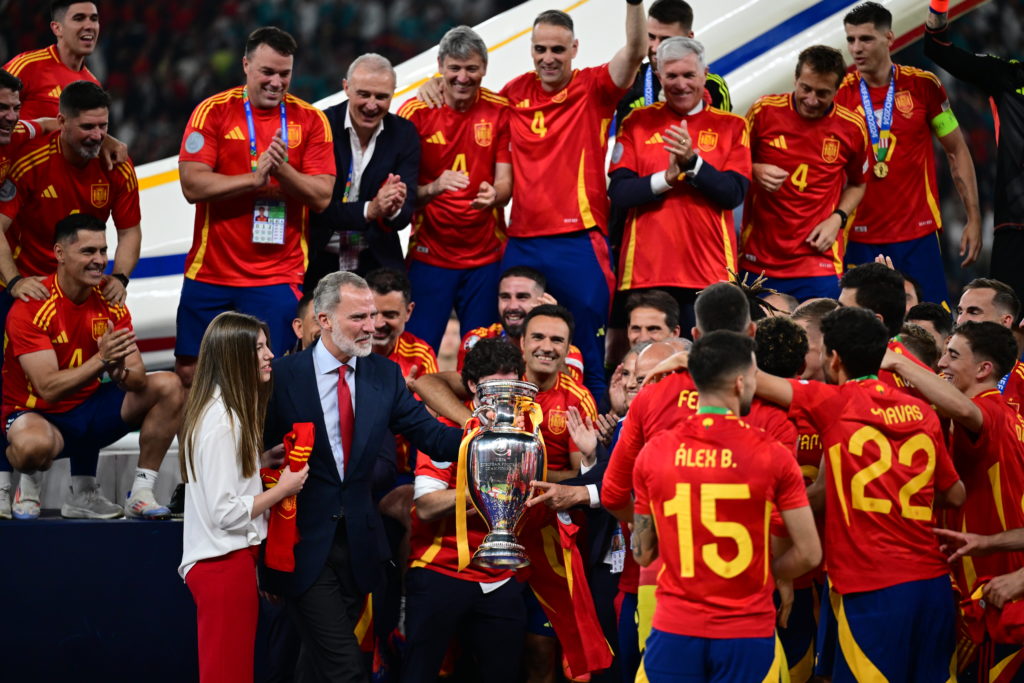 Players of Spain celebrate with the trophy after winning the UEFA EURO 2024 final match between Spain and England at Olympiastadion in Berlin, Germ...