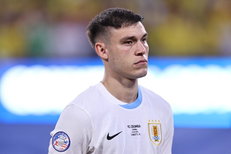 Manuel Ugarte of Uruguay lines up prior to the CONMEBOL Copa America 2024 semifinal match between Uruguay and Colombia at Bank of America Stadium o...