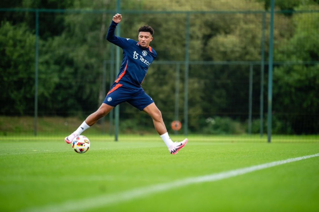 Jadon Sancho of Manchester United in action during a first team pre-season training session at Carrington Training Ground on July 11, 2024 in Manch...