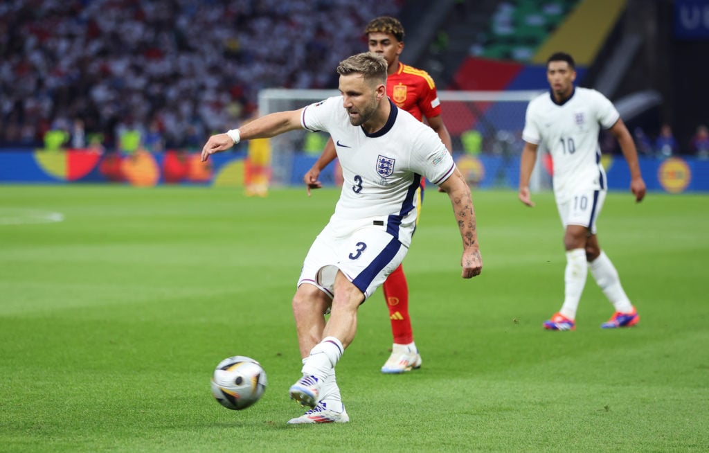 Luke Shaw of England passes the ball during the UEFA EURO 2024 final match between Spain and England at Olympiastadion on July 14, 2024 in Berlin, ...