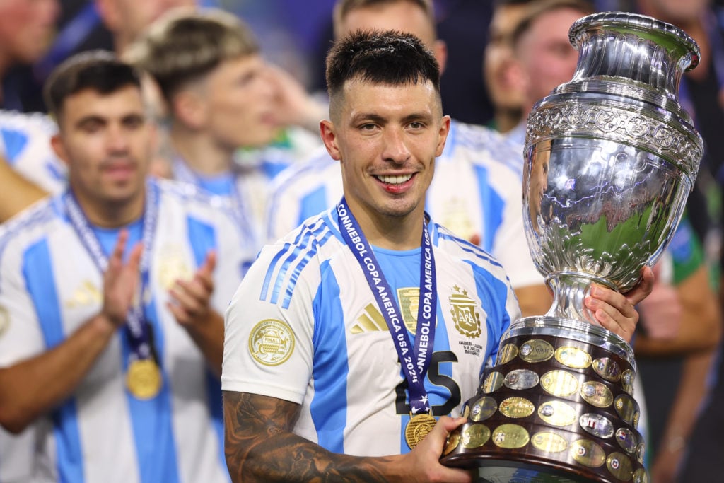 Lisandro Martinez of Argentina celebrates with the trophy after winning the CONMEBOL Copa America 2024 Final match between Argentina and Colombia a...