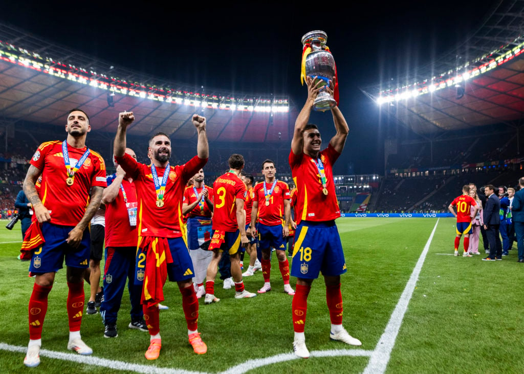 Martin Zubimendi of spain celebrates the trophy with team and fans after the UEFA EURO 2024 final match between Spain and England at Olympiastadion...