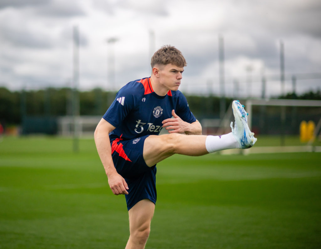 Ethan Ennis of Manchester United in action during a pre-season training session at Carrington Training Ground on July 22, 2024 in Manchester, England.