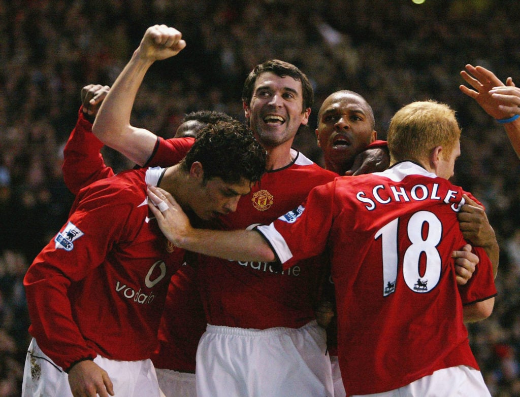 Paul Scholes celebrates against Aston Villa with Roy Keane and Cristiano Ronaldo during the Barclays Premiership match between Manchester United and Aston Villa at Old Trafford in 2005 in Manchester, England.