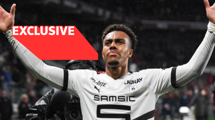 Rennes' Guela Doue celebrates with arms outstretched, with Exclusive graphic