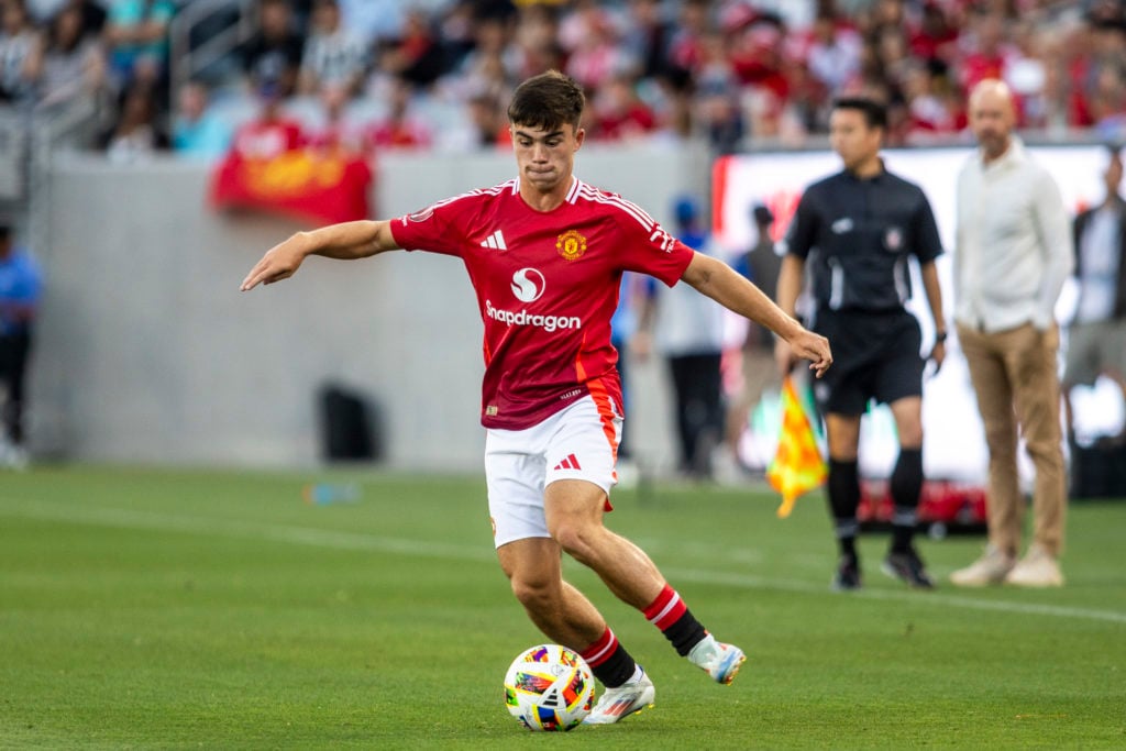 Manchester United defender Harry Amass (4) controls the ball in the first half of a friendly match between Manchester United and Real Betis, Wednes...