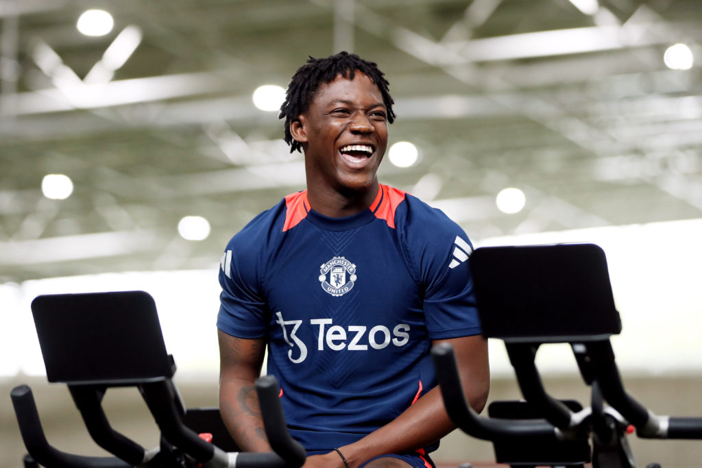 Kobbie Mainoo of Manchester United in action during a first team training session at Carrington Training Ground on August 05, 2024 in Manchester, E...