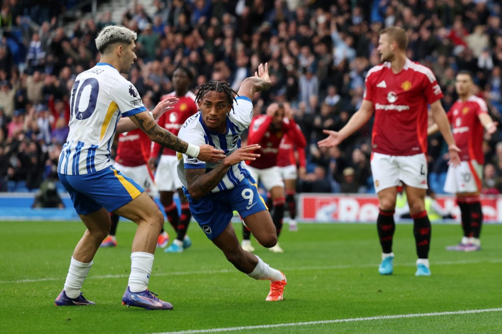 Joao Pedro of Brighton & Hove Albion celebrates scoring his team's second goal with teammates Julio Enciso during the Premier League match betw...