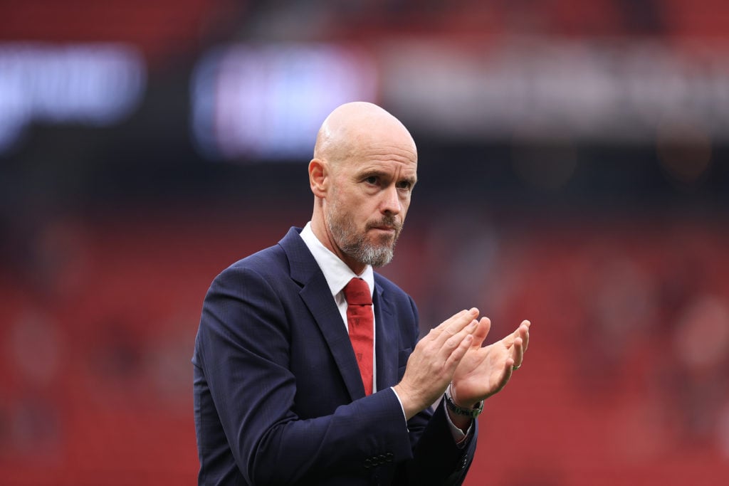 Manchester United manager Erik ten Hag applauds the support after the Premier League match between Manchester United FC and Liverpool FC at Old Tra...