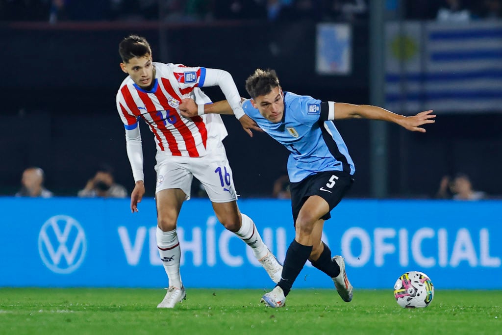 Damian Bobadilla of Paraguay and Manuel Ugarte of Uruguay battle for the ball during the South American FIFA World Cup 2026 Qualifier between Urugu...