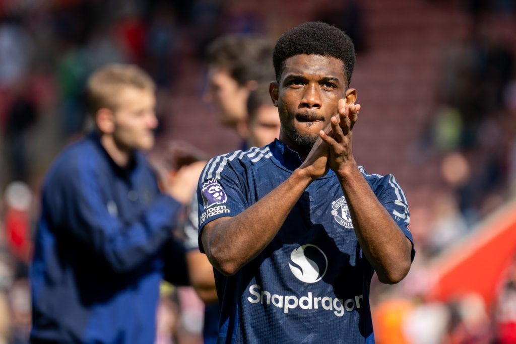 Amad Diallo of Manchester United applauds fans following the Premier League match between Southampton FC and Manchester United FC at St Mary's Stad...