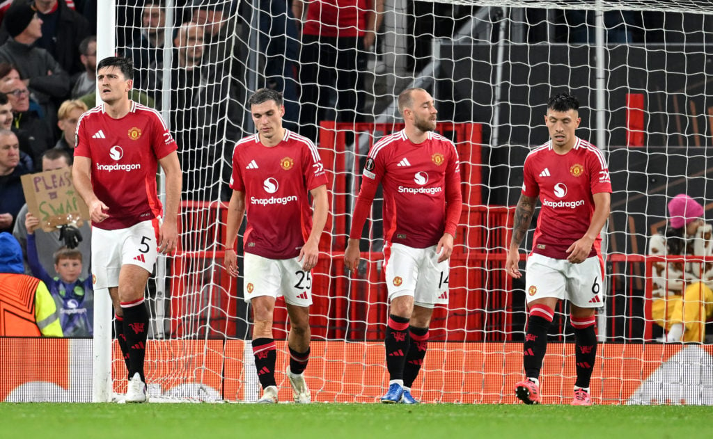 Harry Maguire, Manuel Ugarte, Christian Eriksen and Lisandro Martinez of Manchester United look dejected after Sam Lammers of FC Twente (not pictur...