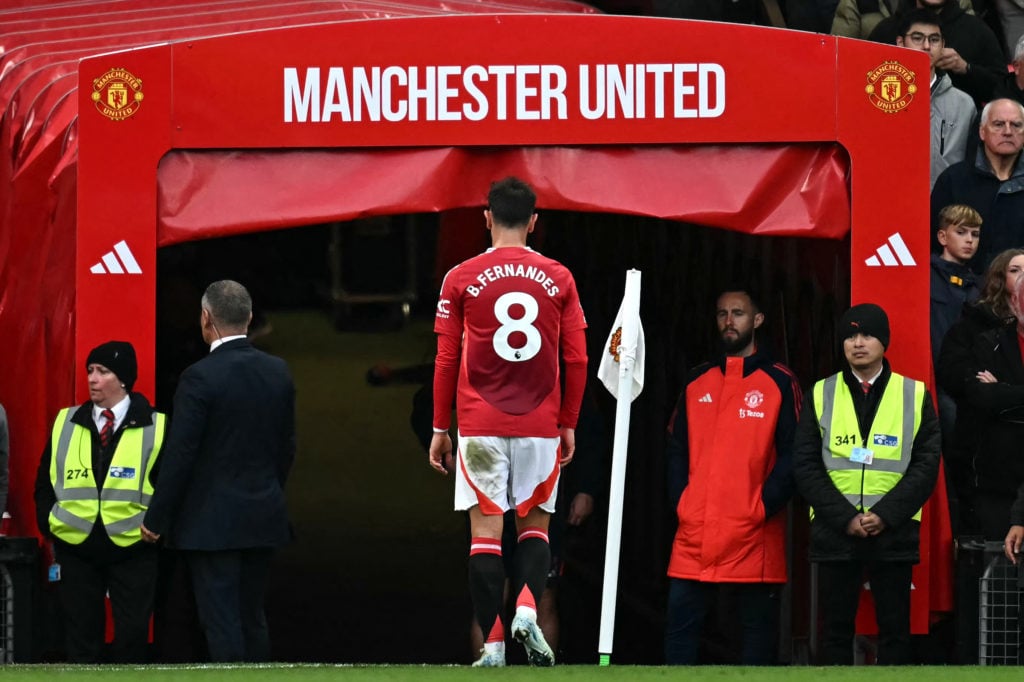 Manchester United's Portuguese midfielder #08 Bruno Fernandes leaves the pitch room after being shown a straight red card by English referee Chris ...