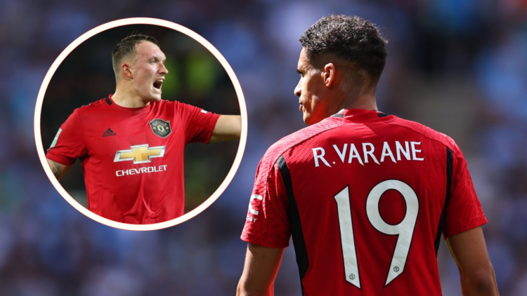 Raphael Varane, with shirt number 19. Phil Jones appeals for decision, inset.