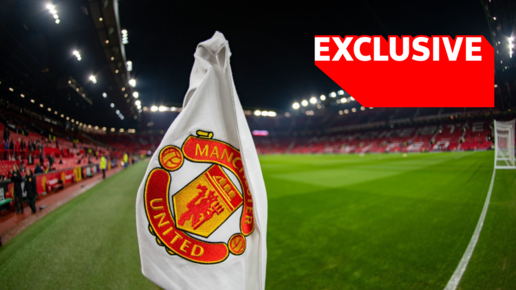 Man Utd badge on corner flag at Old Trafford, with Exclusive logo