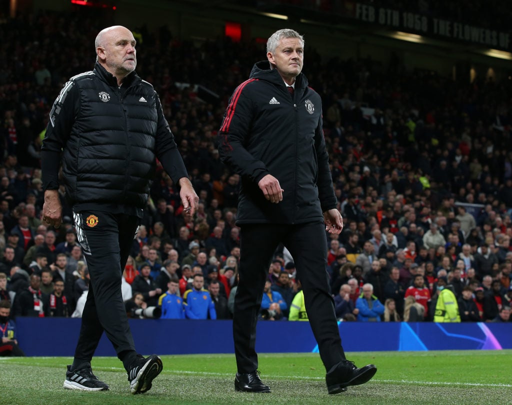 Manager Ole Gunnar Solskjaer and Assistant manager Mike Phelan of Manchester United walk out for the second half during the UEFA Champions League g...