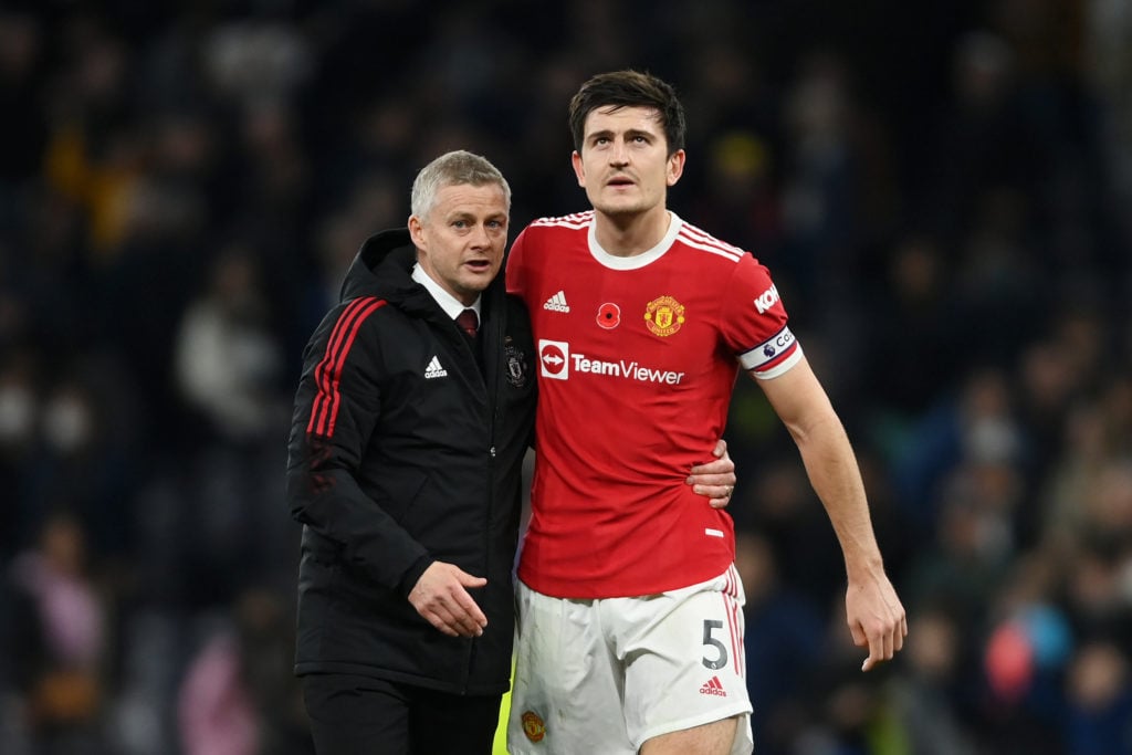 Ole Gunnar Solskjaer embraces Harry Maguire of Manchester United after their sides victory in the Premier League match between Tottenham Hotspur an...