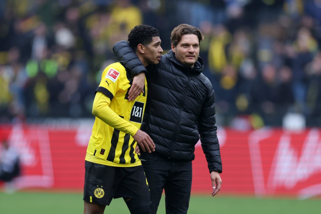 Edin Terzic, Head Coach of Borussia Dortmund, interacts with Jude Bellingham of Borussia Dortmund after the Bundesliga match between Borussia Dortm...