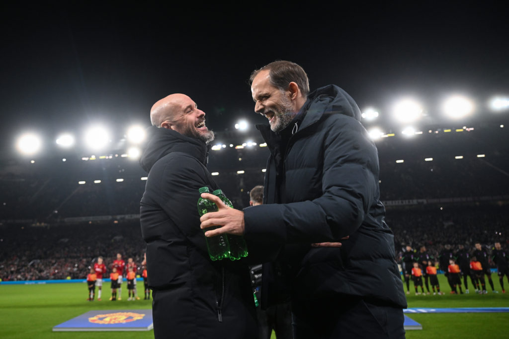 Manchester United manager Erik ten Hag laughs with Bayern Munich manager Thomas Tuchel before the UEFA Champions League match between Manchester Un...