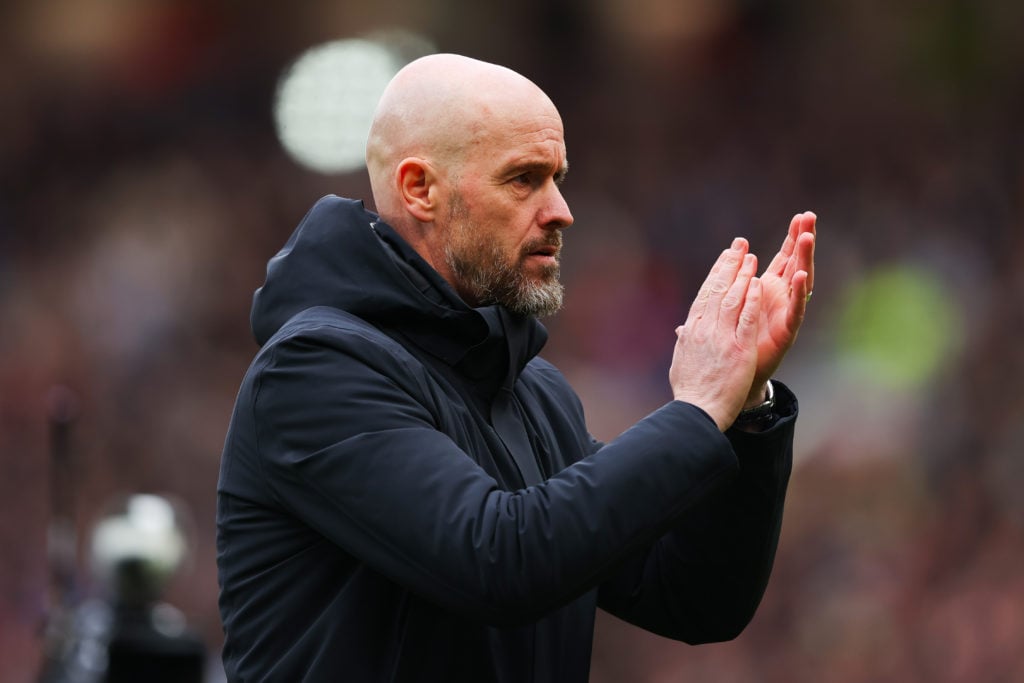 Erik ten Hag applauds Manchester United supporters.