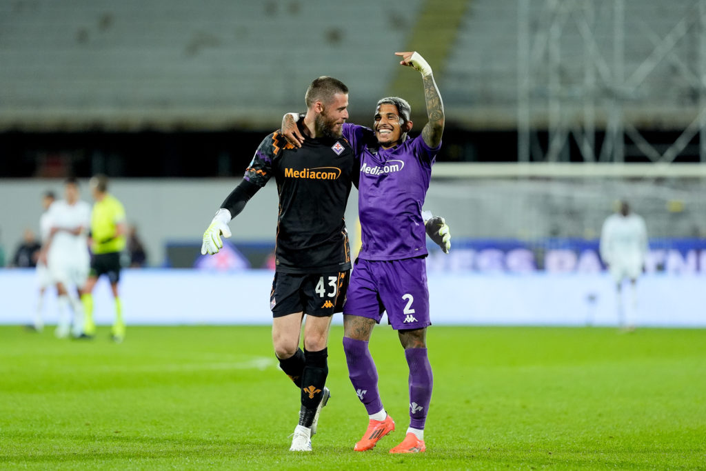 Dodo of ACF Fiorentina celebrates with David De Gea after Albert Gudmundsson scored second goal during the Serie A Enilive match between ACF Fioren...