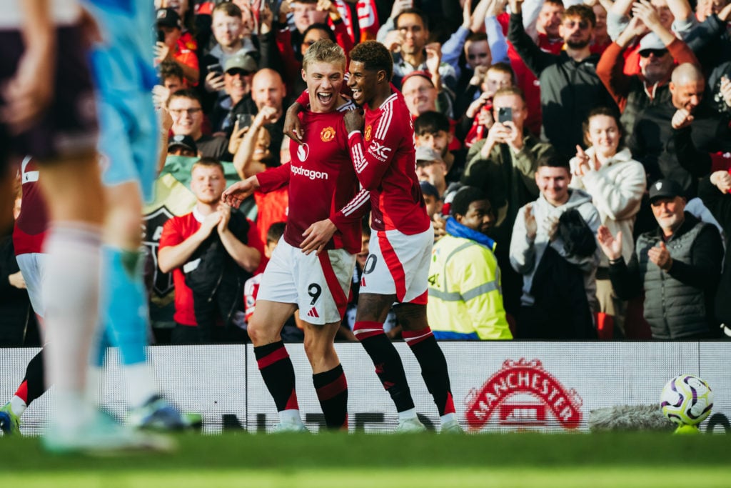 Rasmus Hojlund of Manchester United celebrates scoring a goal to make the score 2-1 with his team-mate Marcus Rashford during the Premier League m...