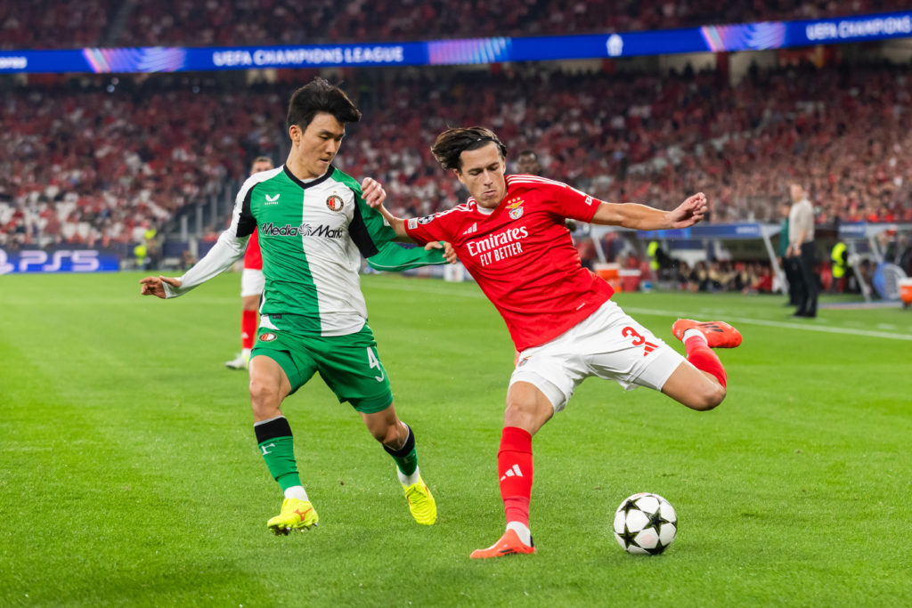 Inbeom Hwang (L) of Feyenoord and Alvaro Carreras (R) of SL