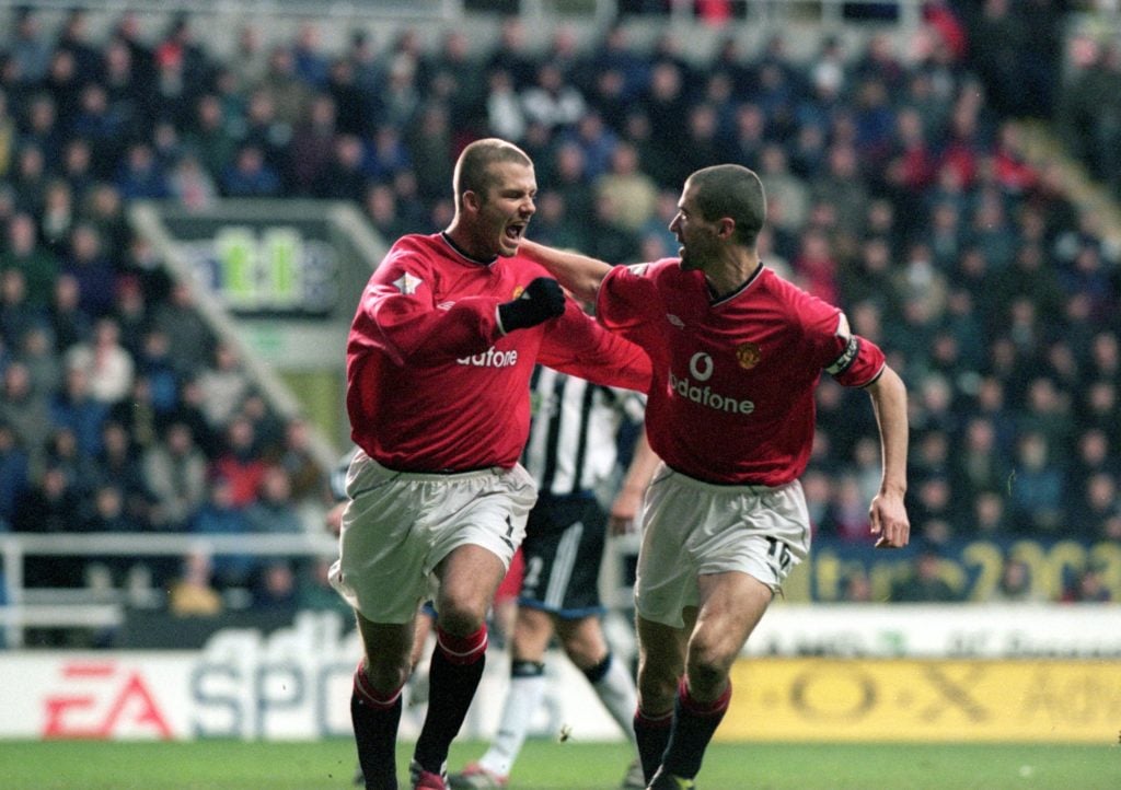 David Beckham (left) and Roy Keane (right) of Manchester United celebrate during the FA Carling Premiership match against Newcastle United played a...