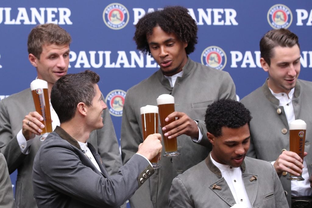 Robert Lewandowski (L) of FC Bayern Muenchen attends with his team mate Joshua Zirkzee the FC Bayern Muenchen and Paulaner photo session at Nockher...